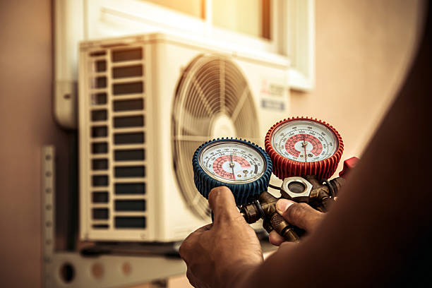 Professional Heat Pump Repair technician working in Fairfield, NJ